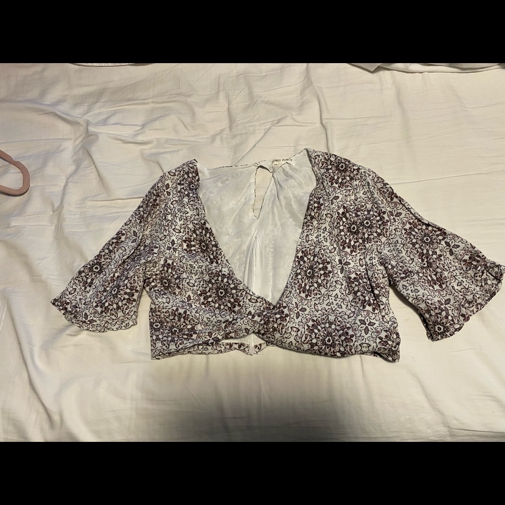 light crop top with a dipped down front